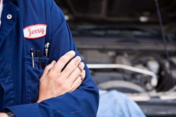 Mechanic with arms crossed