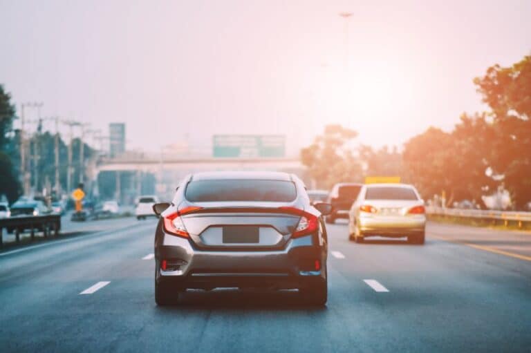 Cars driving in traffic