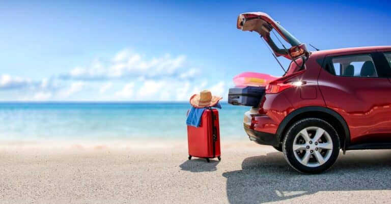 Car with luggage and beach gear