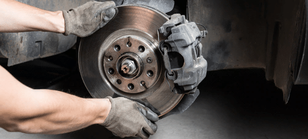 Brakes being repaired by mechanic