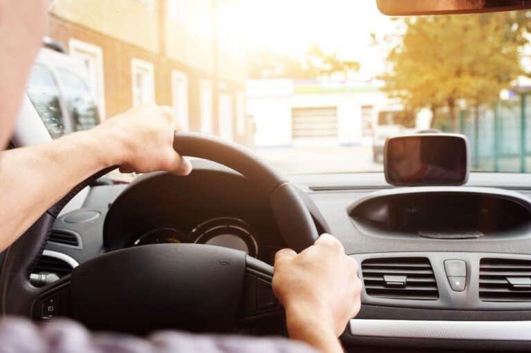 Man driving his car
