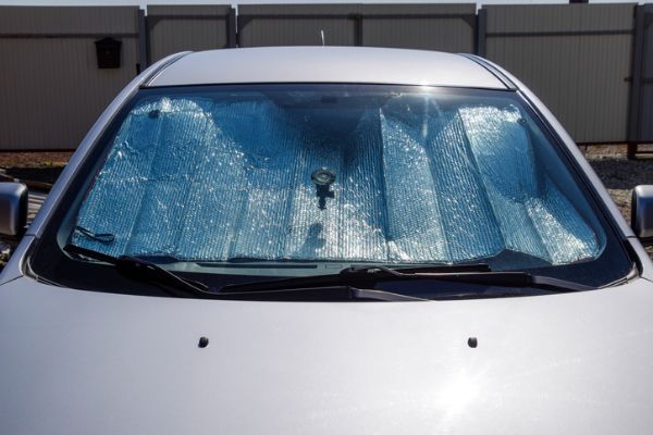 Windshield cover in a sedan