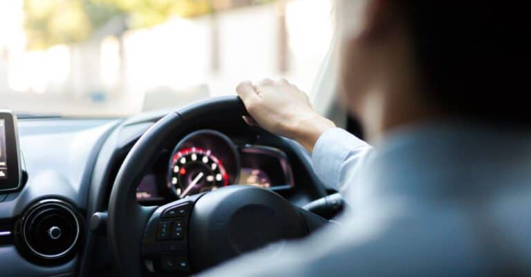 POV man driving his car
