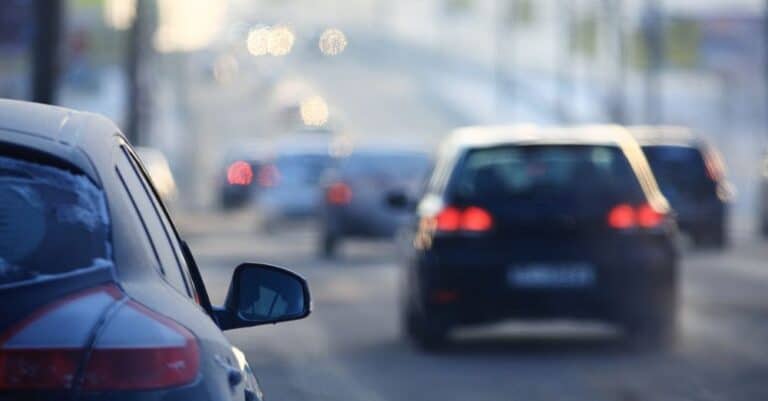 Cars driving safely on road